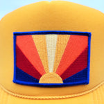 Load image into Gallery viewer, Sunburst Patch Gold Trucker Cap
